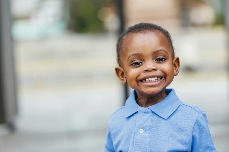 blog-2 A smiling young boy ready for school