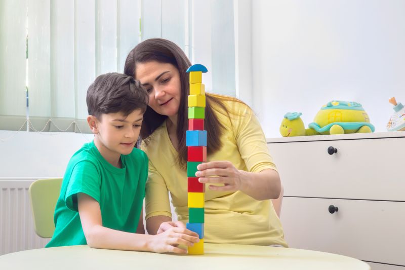 a therapist with a child for early intervention